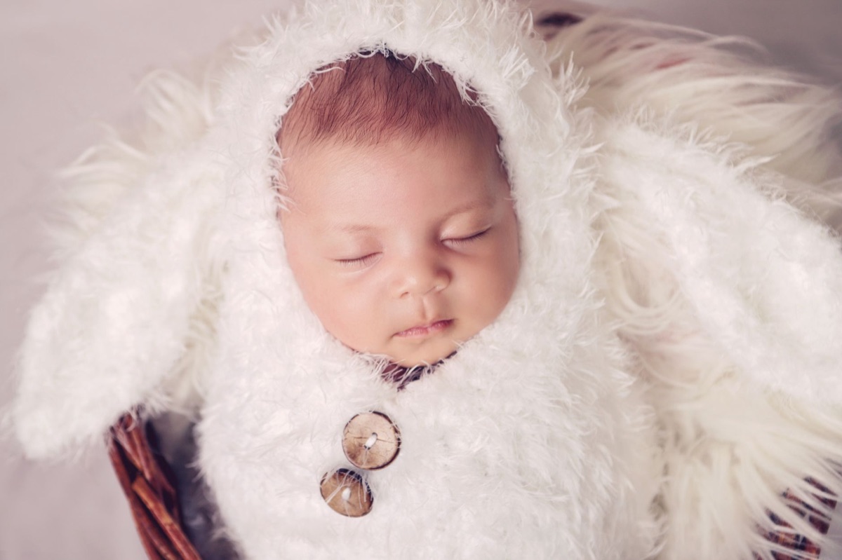 Baby sleep monitoring equipment and white noise machine on a nightstand