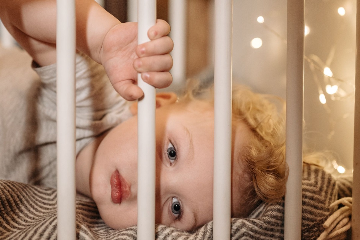 Baby in crib with nightlight