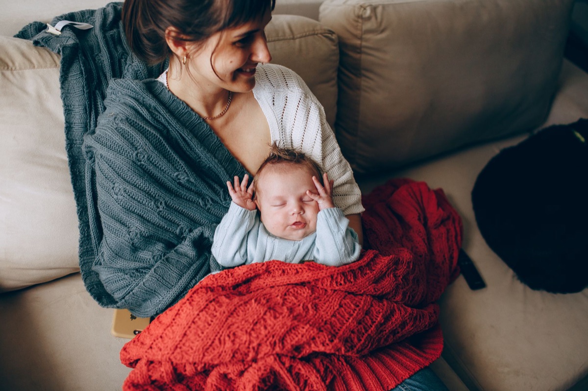 Parent helping baby sleep