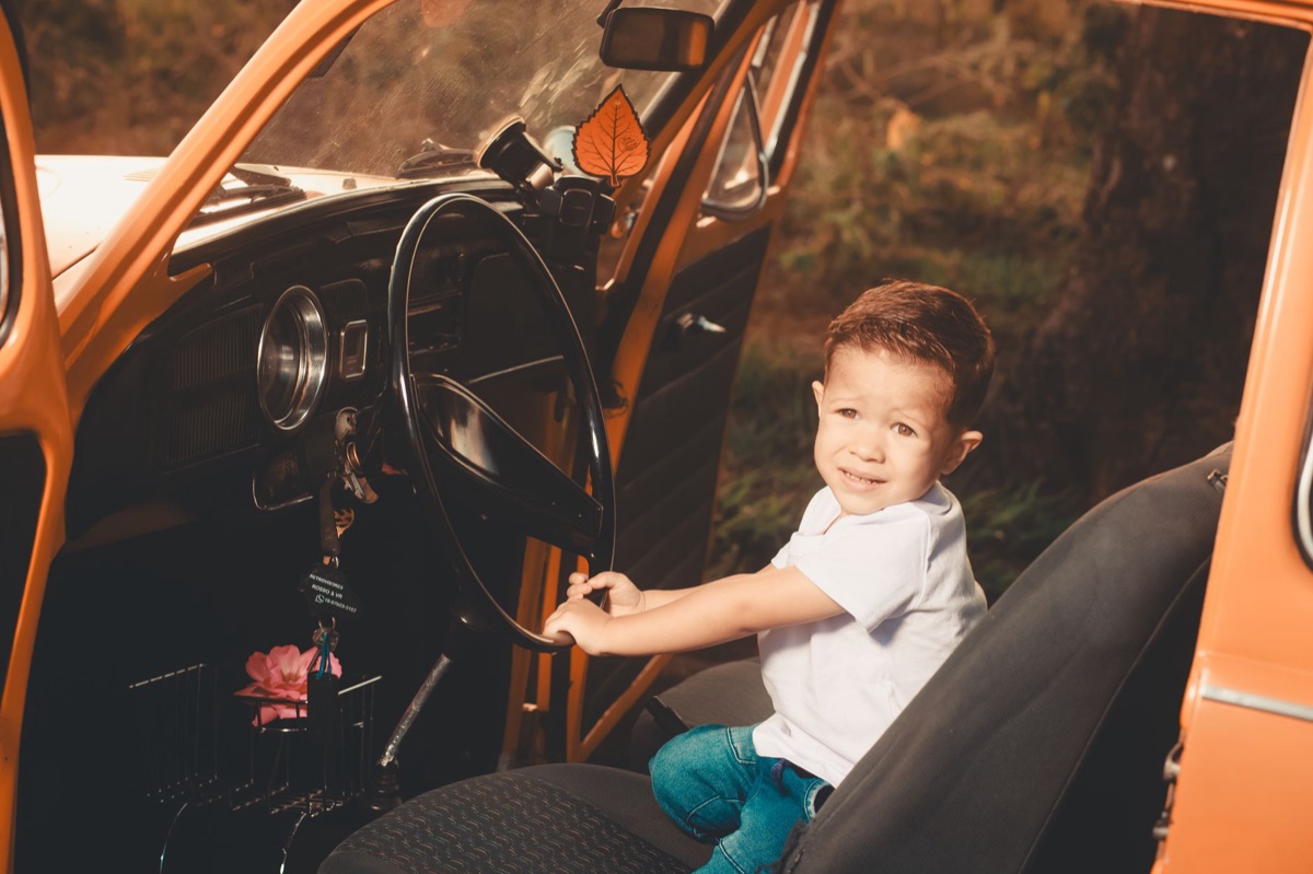 Close-up of a properly installed child safety harness in a car seat